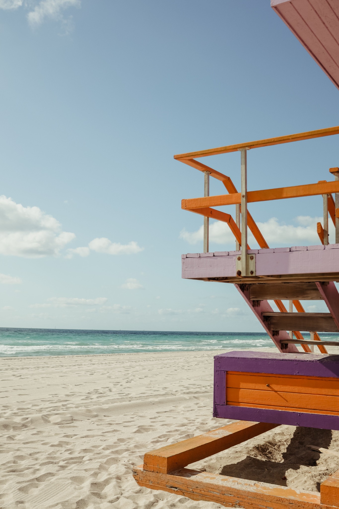 Pastel lifeguard stand beside the Atlantic Ocean